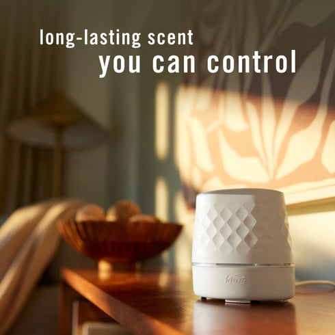 Febreze PLUG Scented Oil Starter Kit, Warmer + 2 Downy & 1 Downy Calm Refills