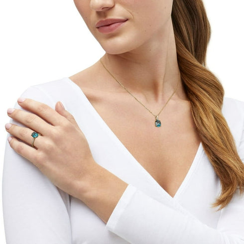 Oval Cut London Blue Topaz and Diamond Accent Ring in 14K Gold