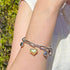 Two-Tone Heart Charm Bracelet in 14K Gold and Sterling Silver