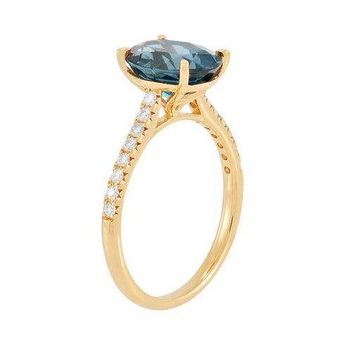 Oval Cut London Blue Topaz and Diamond Accent Ring in 14K Gold